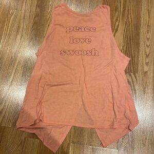 Large Nike peach colored workout top.